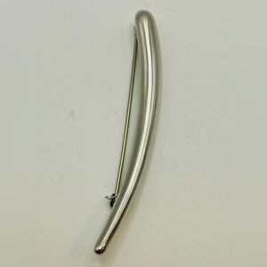 Monet Silver-Tone Modernist Curved Metal Brooch Pin